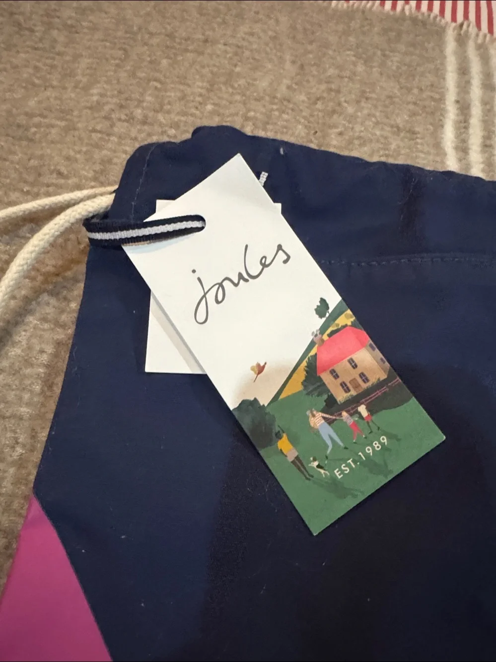 Joules Navy Drawstring Backpack with Rainbow Rays and Horse Motif